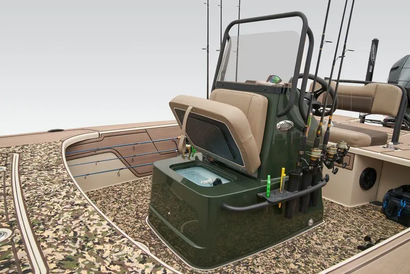 Slide: The Image of 2025 Mako Pro Skiff 18 Backwater Edition with camouflage deck and fishing rod holders. - 38