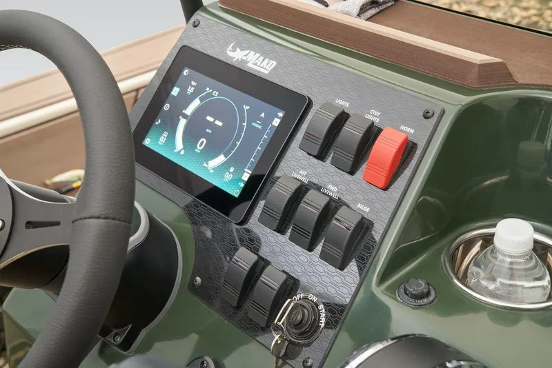 Slide: The Image of Control panel of 2025 Mako Pro Skiff 18 Backwater Edition with digital display and switches. - 42