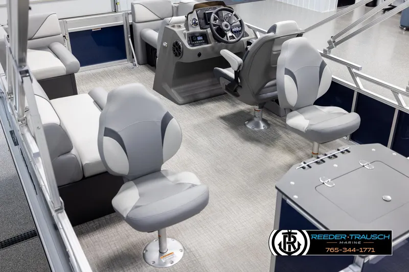 Slide: The Image of Interior of 2025 Avalon VEN RF boat with modern seating and steering console. - 11
