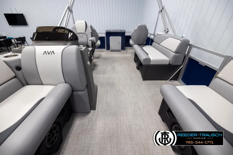 Slide: The Image of Interior of 2025 Avalon VEN RF boat with modern seating and steering console. - 13