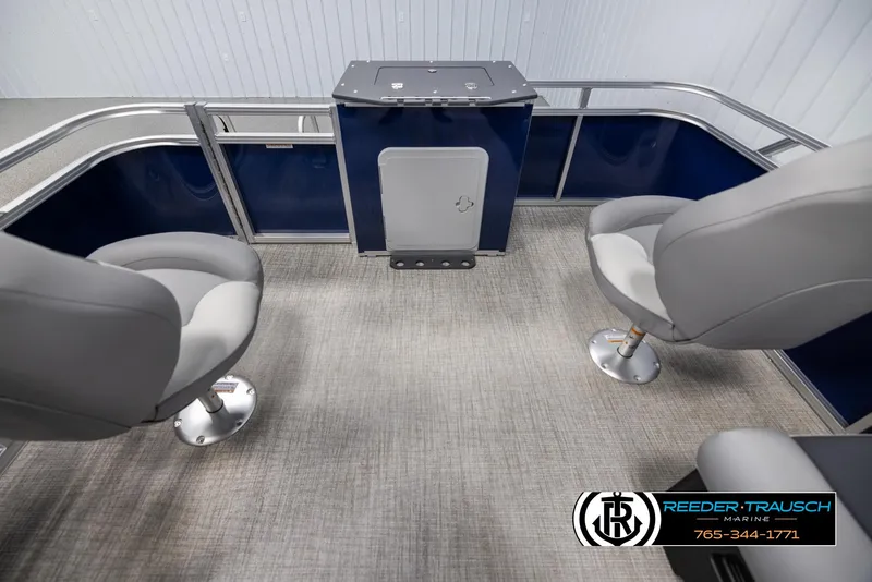 Slide: The Image of Interior of 2025 Avalon VEN RF boat with gray seats and blue paneling. - 15