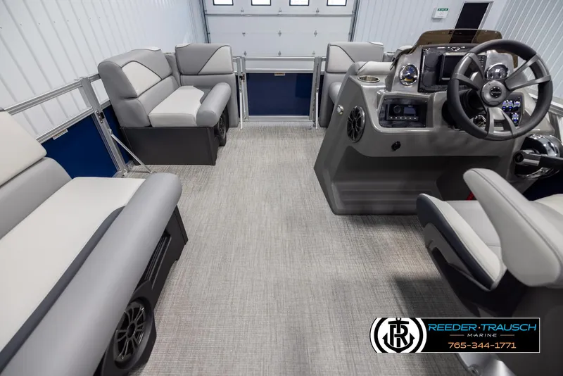 Slide: The Image of Interior of 2025 Avalon VEN RF boat with modern seating and steering console. - 17
