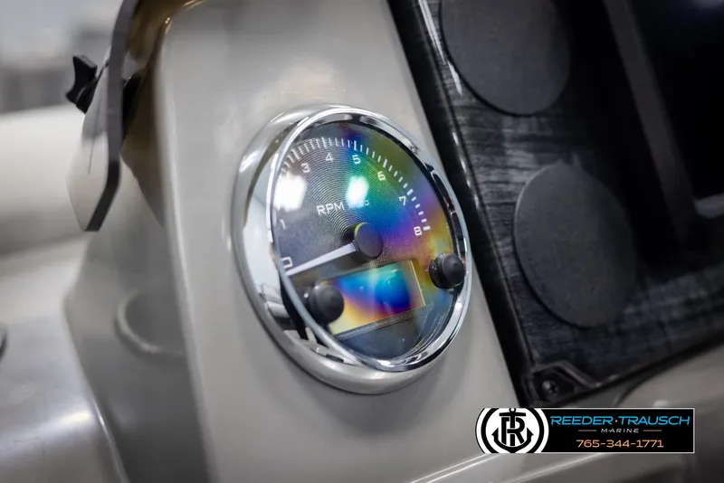 Slide: The Image of Close-up of Avalon VEN RF 2025 boat tachometer with rainbow reflection. - 28