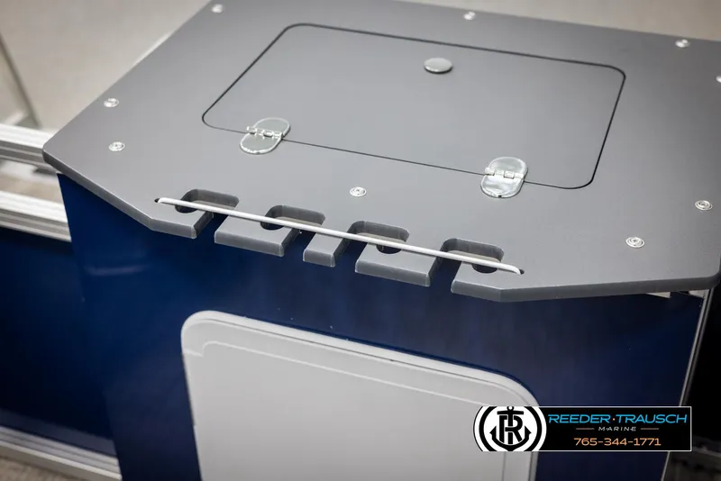 Slide: The Image of 2025 Avalon VEN RF boat console with storage compartment and rod holders. - 36