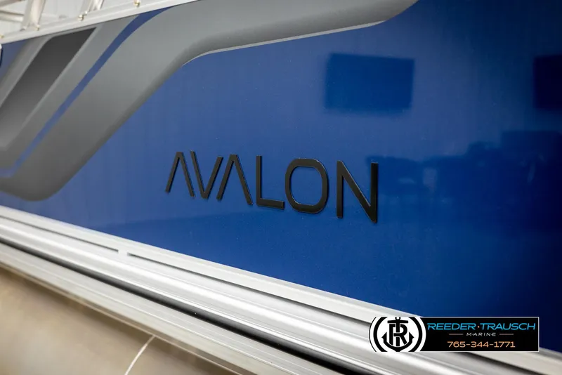 Slide: The Image of 2025 Avalon VEN RF boat with blue and gray design, Reeder-Trausch Marine branding. - 41