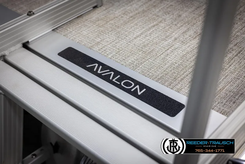 Slide: The Image of 2025 Avalon VEN RF boat interior detail with logo and textured flooring. - 44