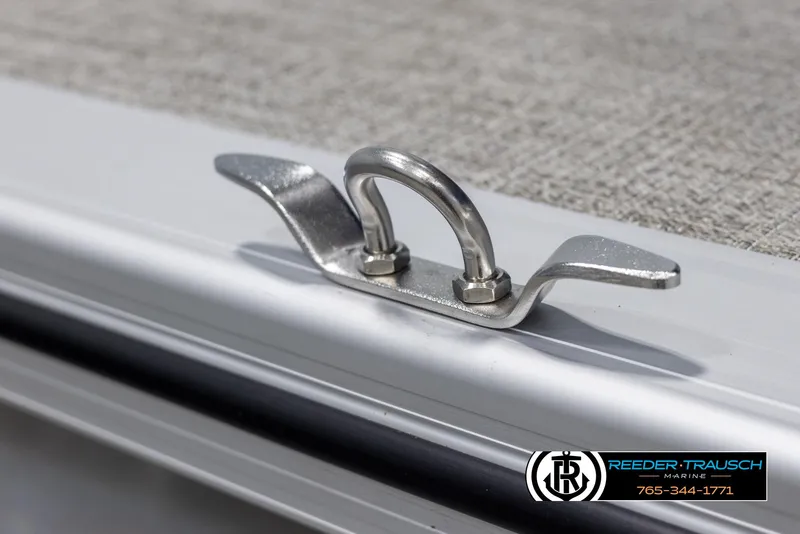 Slide: The Image of Stainless steel cleat on Avalon VEN RF 2025 boat deck, Reeder-Trausch Marine branding. - 46