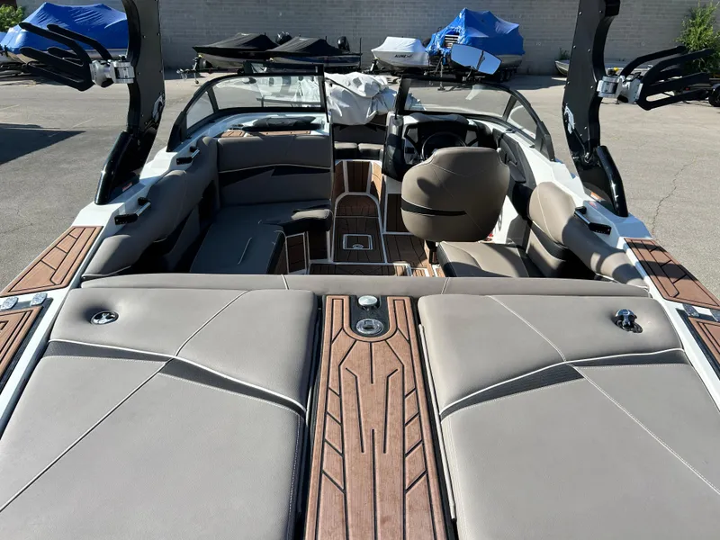 Slide: The Image of 2019 Centurion Fi21 boat interior with sleek seating and modern design. - 4