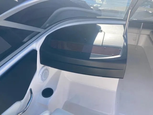 Slide: The Image of 2008 Regal 1900 Bowrider interior with open windshield and seating area. - 9