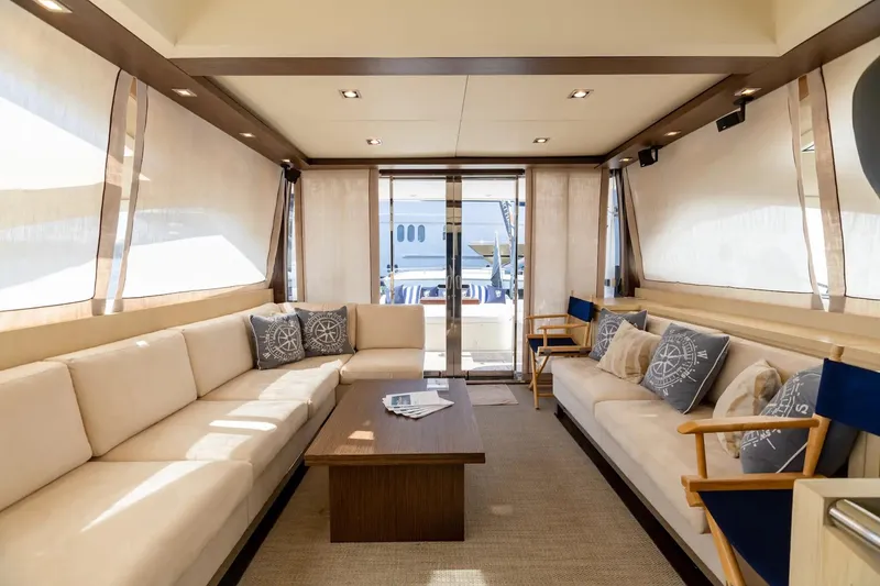 Slide: The Image of Luxurious interior of 2009 Uniesse 68 Sport Yacht with elegant seating and modern decor. - 17
