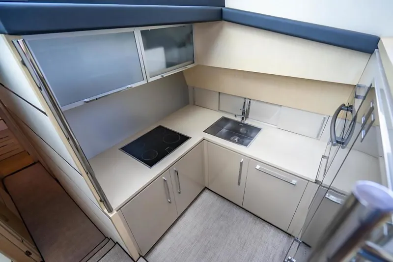 Slide: The Image of Modern kitchen in 2009 Uniesse 68 Sport Yacht with sleek cabinetry and appliances. - 22