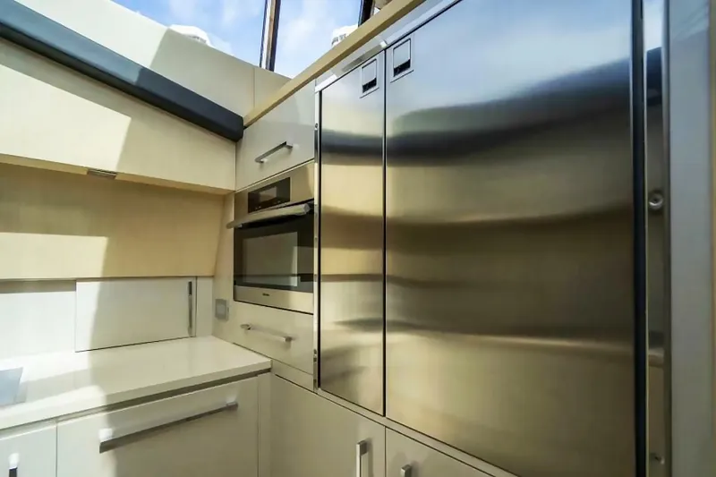 Slide: The Image of Modern kitchen interior of 2009 Uniesse 68 Sport Yacht with stainless steel appliances. - 24