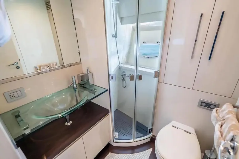 Slide: The Image of Luxurious bathroom in 2009 Uniesse 68 Sport Yacht with glass sink and shower. - 28