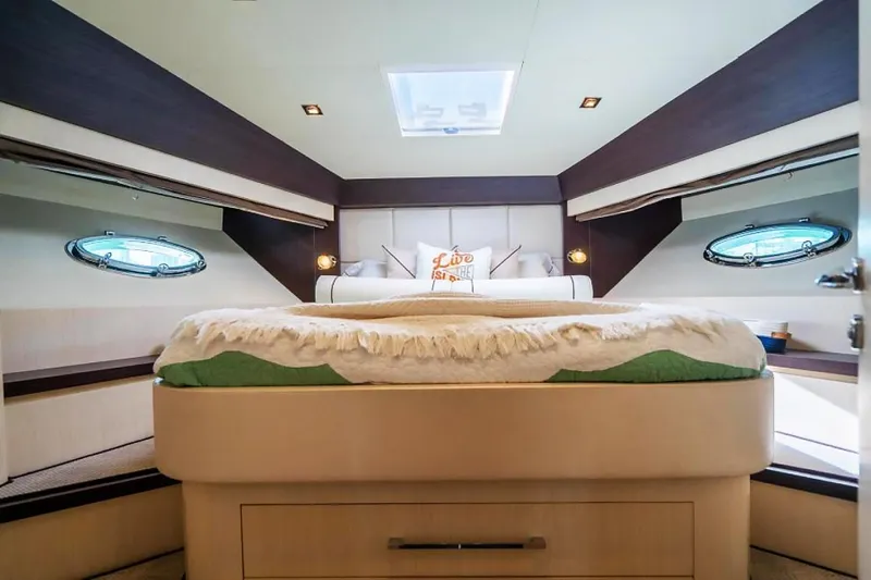 Slide: The Image of Luxurious bedroom interior of 2009 Uniesse 68 Sport Yacht with modern design and skylight. - 29