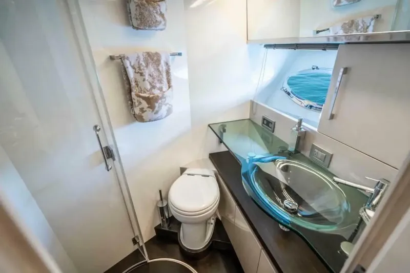 Slide: The Image of Luxurious bathroom in 2009 Uniesse 68 Sport Yacht with modern fixtures and ocean view. - 31