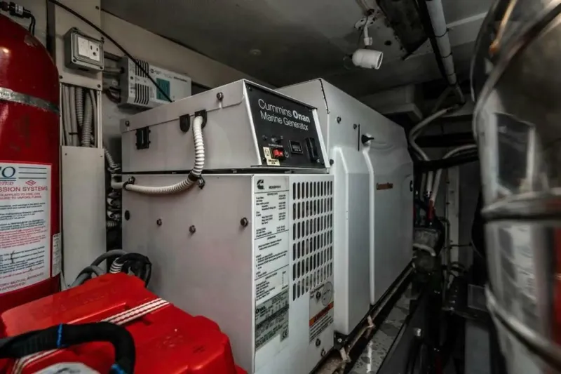 Slide: The Image of Cummins Onan marine generator in 2009 Uniesse 68 Sport Yacht engine room. - 38