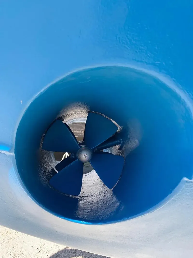 Slide: The Image of Close-up of a 2009 Uniesse 68 Sport Yacht's blue propeller. - 43