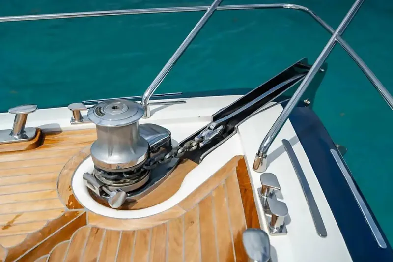 Slide: The Image of Deck of 2009 Uniesse 68 Sport Yacht with anchor winch and teak flooring. - 7