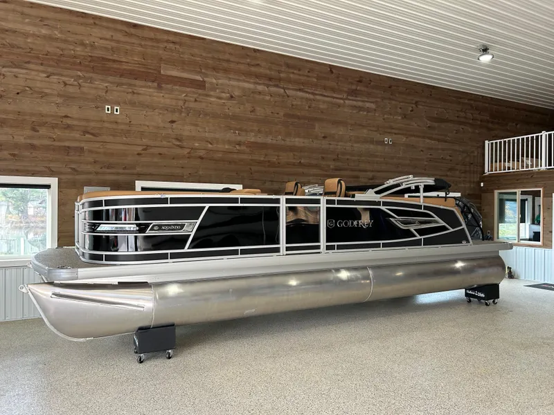 The Image of 2025 Godfrey Aqua Patio 235 ULC pontoon boat in showroom. - 0