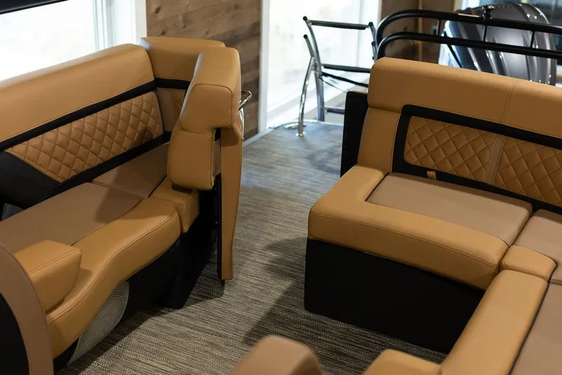 Slide: The Image of Luxurious interior of 2025 Godfrey Aqua Patio 235 ULC with tan leather seating. - 19