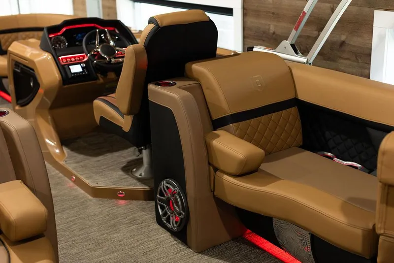 Slide: The Image of Luxurious interior of 2025 Godfrey Aqua Patio 235 ULC with tan leather seating and modern dashboard. - 20