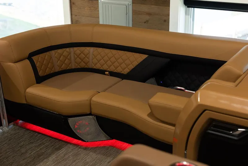 Slide: The Image of Luxurious seating on 2025 Godfrey Aqua Patio 235 ULC boat with elegant design and ambient lighting. - 23