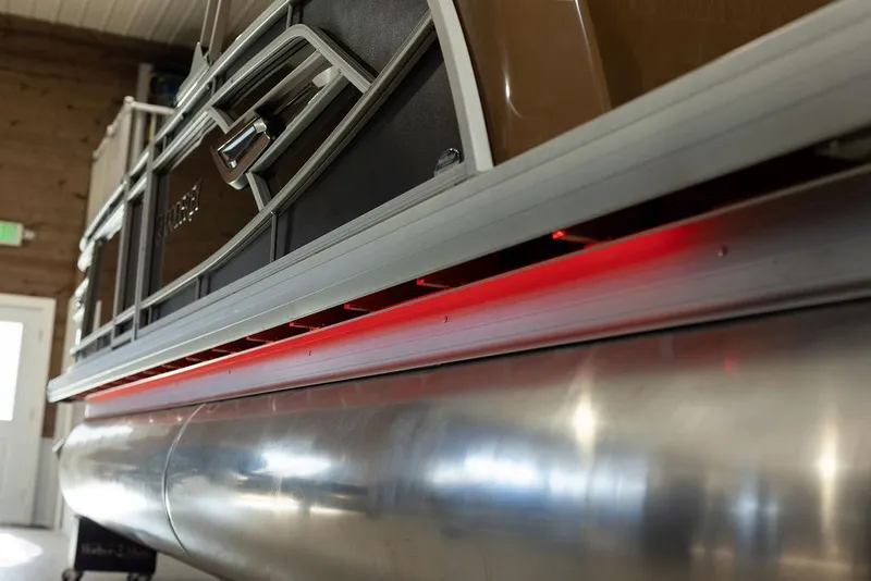 Slide: The Image of 2025 Godfrey Aqua Patio 235 ULC pontoon boat with red LED lighting. - 25