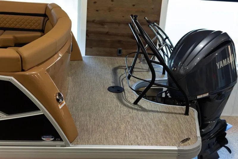 Slide: The Image of 2025 Godfrey Aqua Patio 235 ULC boat with Yamaha engine, rear deck view. - 27