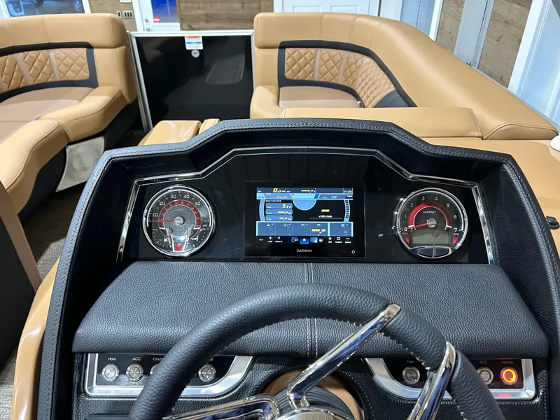 Slide: The Image of 2025 Godfrey Aqua Patio 235 ULC dashboard with modern controls and luxurious seating. - 8