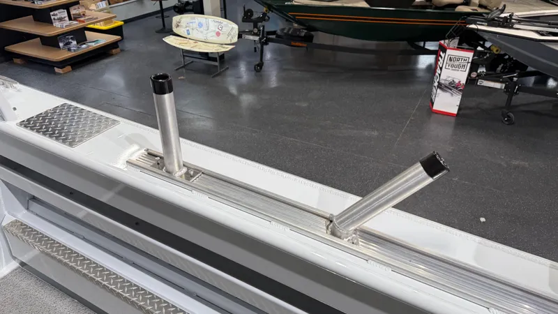 Slide: The Image of 2025 Hewescraft 240 Ocean Pro ET HT boat with rod holders in a showroom. - 18