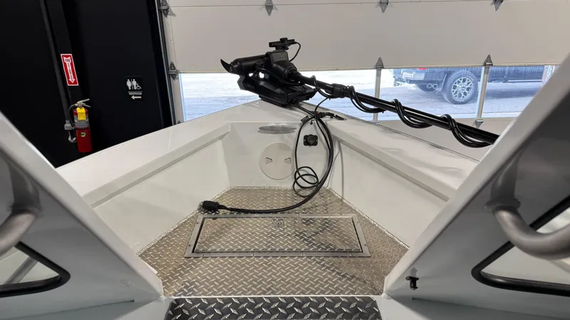 Slide: The Image of 2025 Hewescraft 240 Ocean Pro ET HT boat interior with diamond plate flooring. - 22