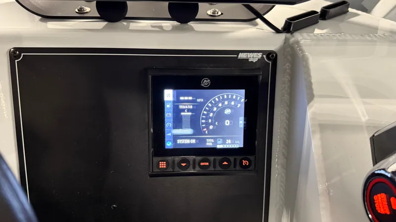Slide: The Image of Dashboard of 2025 Hewescraft 240 Ocean Pro ET HT boat with digital display. - 32