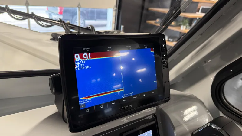 Slide: The Image of Fishfinder display on 2025 Hewescraft 240 Ocean Pro ET HT boat dashboard. - 33