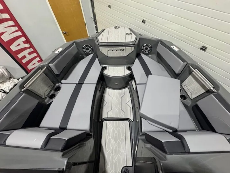 Slide: The Image of 2025 Yamaha Boats 222XD interior with gray seating and modern design. - 3