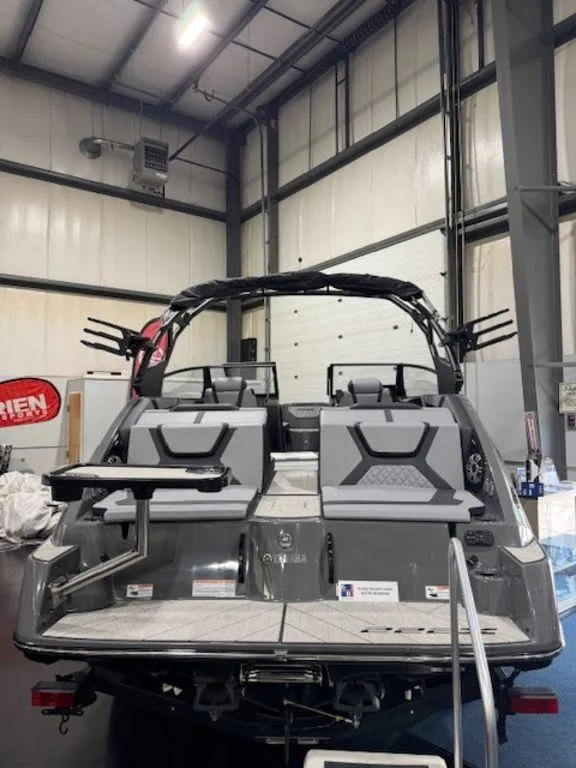 Slide: The Image of 2025 Yamaha Boats 222XD in showroom, showcasing sleek design and modern features. - 8