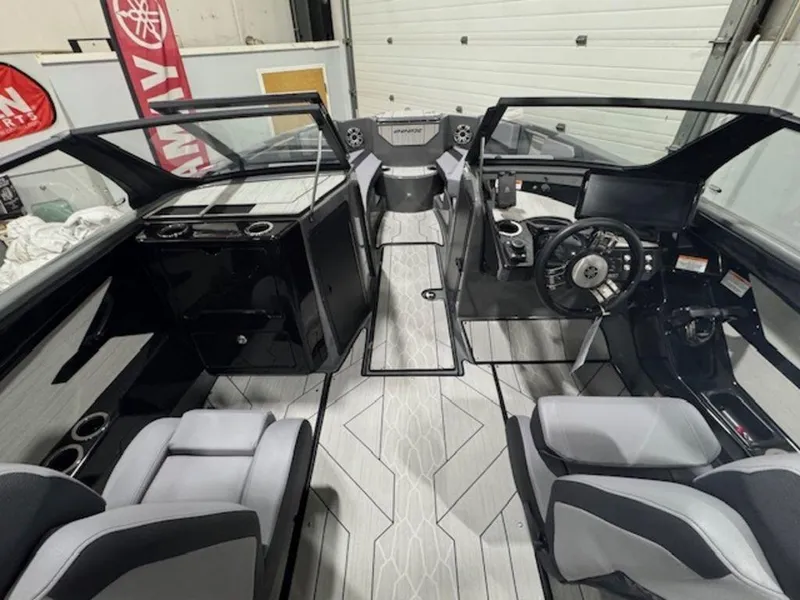 Slide: The Image of Interior of 2025 Yamaha Boats 222XD, featuring modern design and sleek dashboard controls. - 9