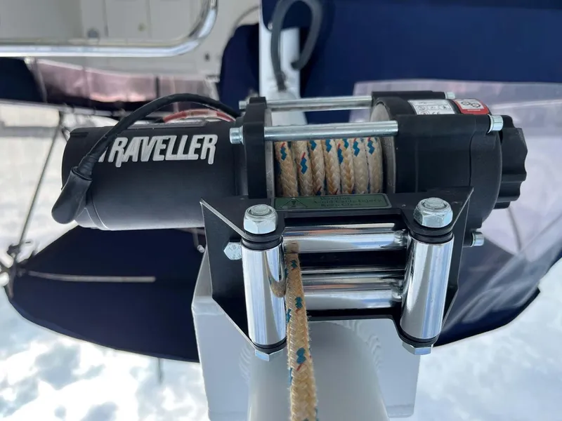 Slide: The Image of Electric winch on 2004 Selene Trawler with rope, labeled "Traveller." - 5