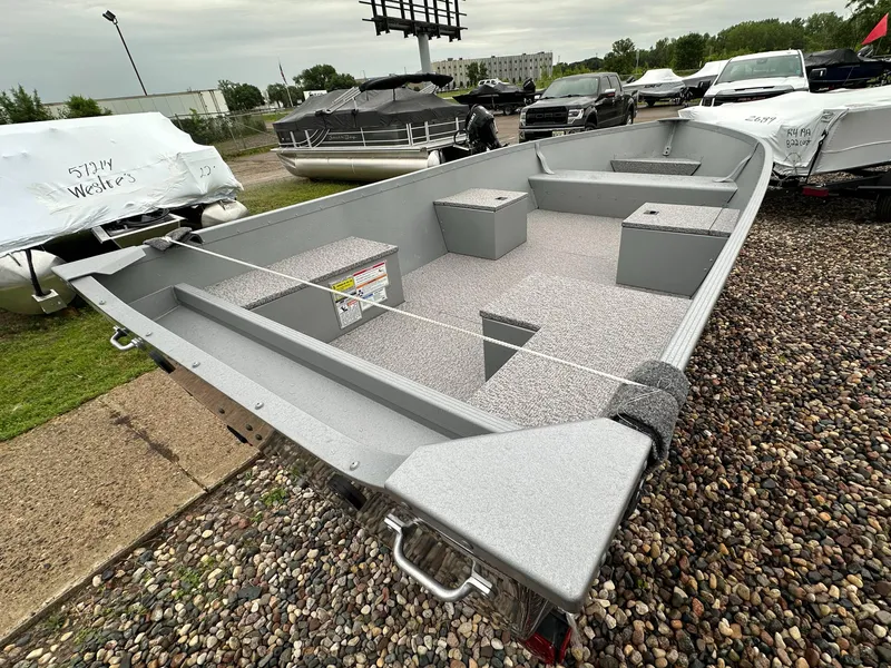 Slide: The Image of 2025 Alumacraft V14 boat on display, featuring spacious interior and modern design. - 4