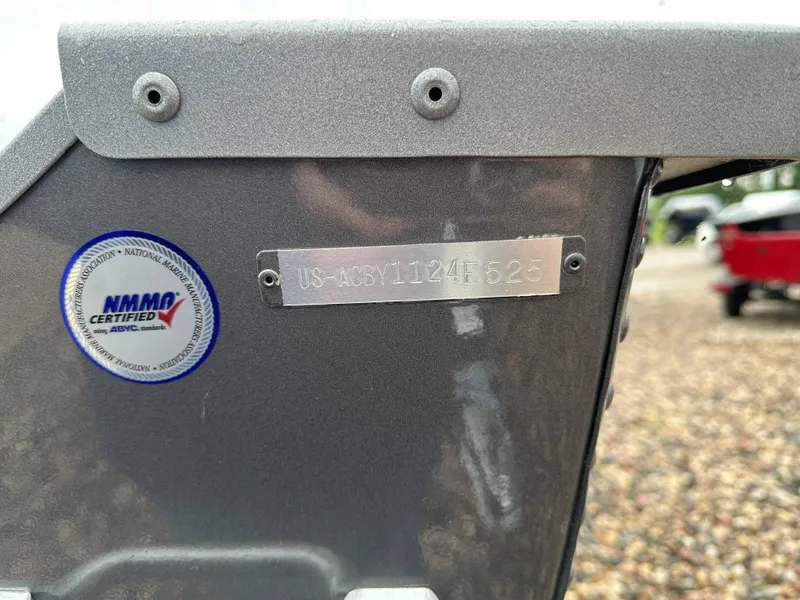 Slide: The Image of 2025 Alumacraft V14 boat with NMMA certification and visible hull identification number. - 7