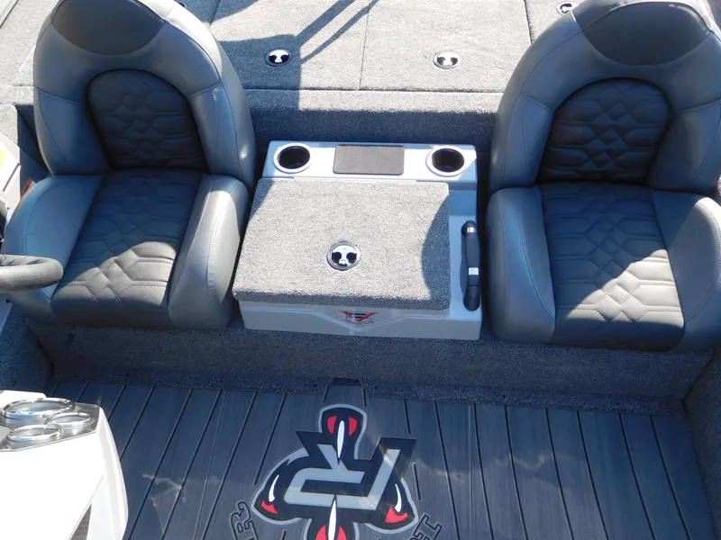 Slide: The Image of 2025 Vexus AVX 1980 boat interior with dual seats and center console. - 2