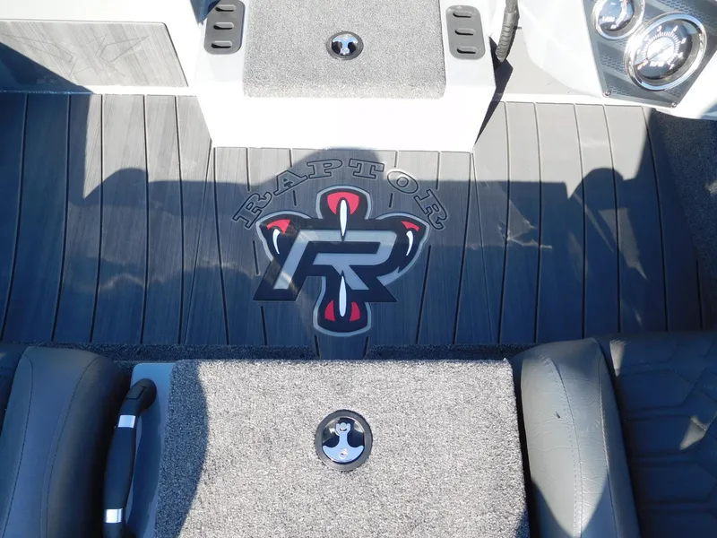 Slide: The Image of 2025 Vexus AVX 1980 boat interior with Raptor logo on deck. - 4
