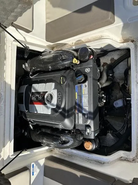 Slide: The Image of 2018 Bayliner VR4 engine compartment with visible motor components. - 3