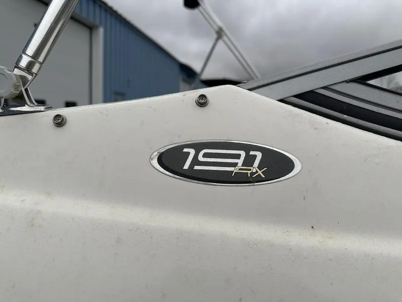 Slide: The Image of Close-up of 2015 Stingray 191RX boat model emblem. - 13