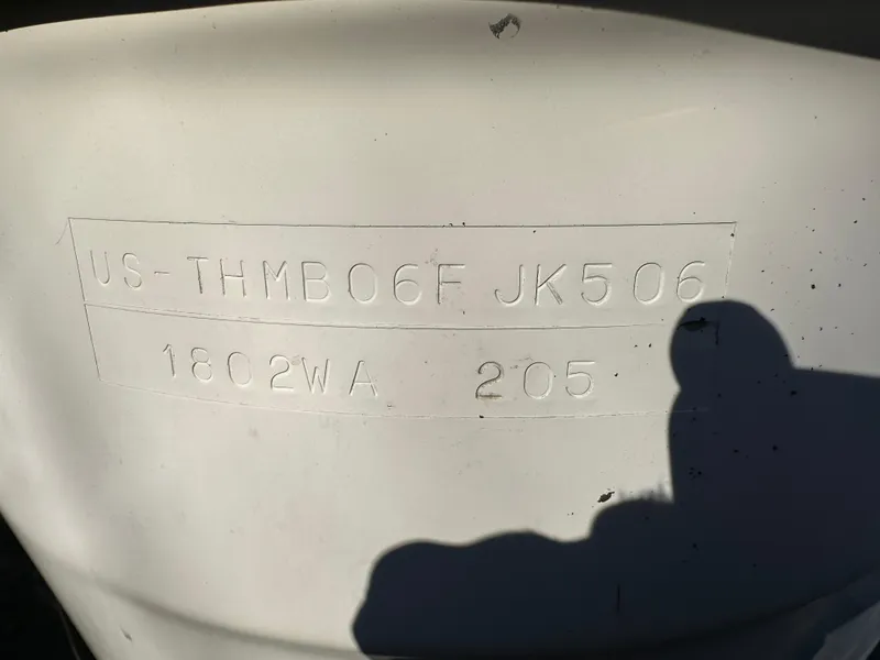 Slide: The Image of Close-up of a 2006 Trophy 1802 WA boat hull identification number. - 5