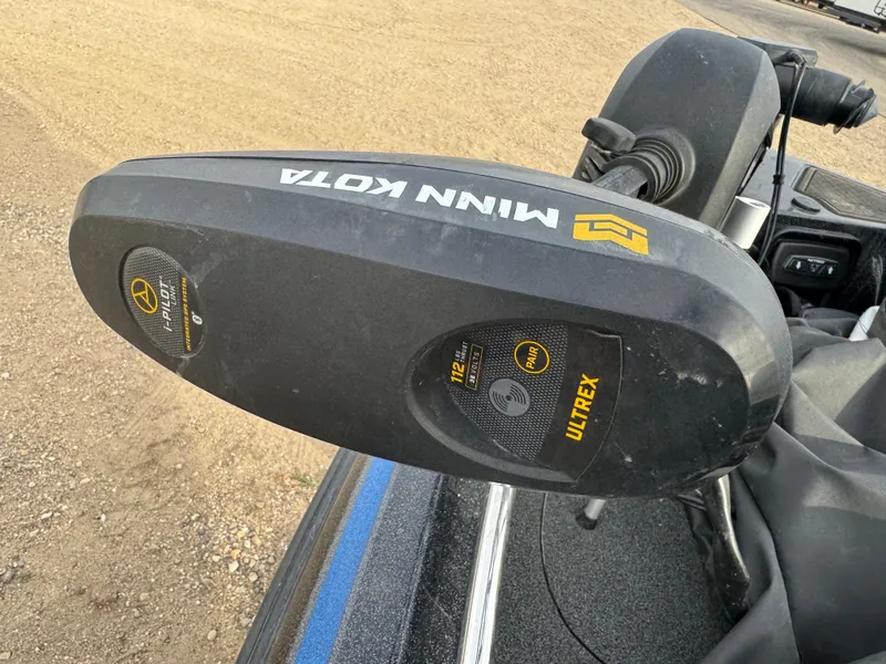 Slide: The Image of Minn Kota Ultrex motor on 2022 Nitro ZV21 boat, close-up view. - 13