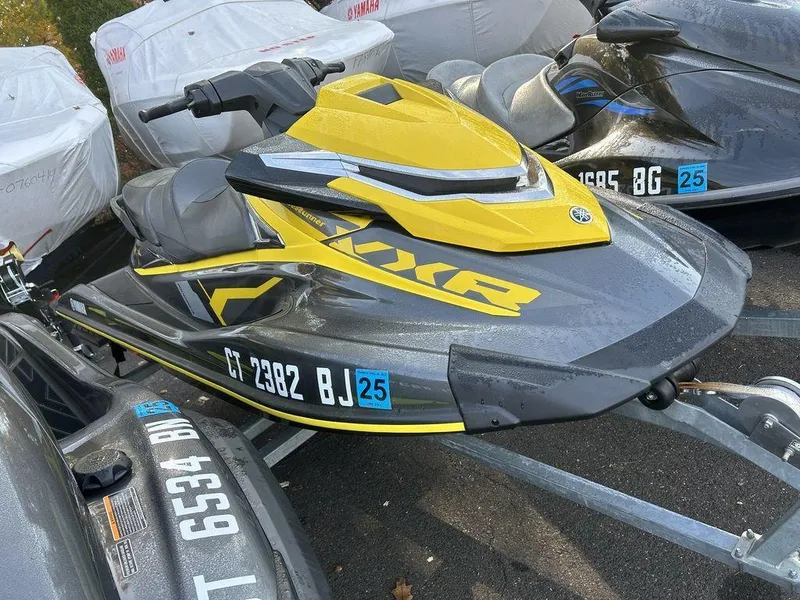 Slide: The Image of 2016 Yamaha WaveRunner VXR® in yellow and gray on a trailer. - 2