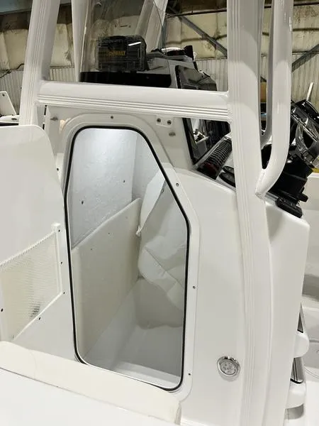 Slide: The Image of 2024 Sea Hunt Ultra 229 boat interior cabin view. - 4