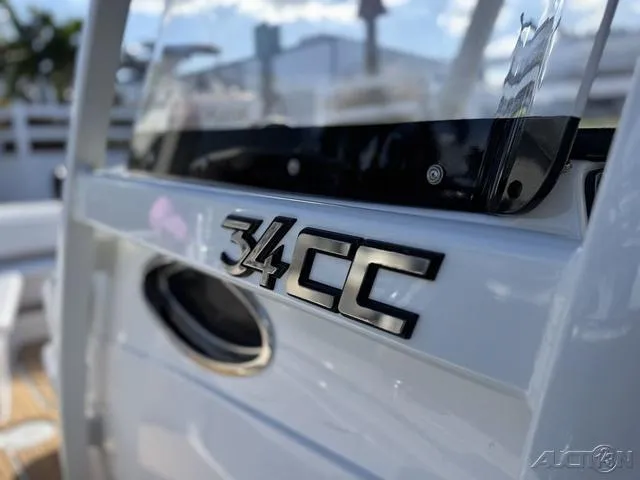 Slide: The Image of Close-up of 2023 Fountain 34 CC boat logo on white surface. - 28