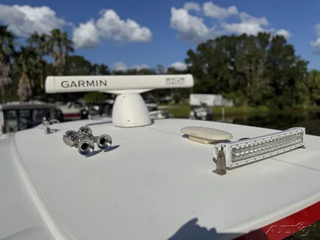 Slide: The Image of 2023 Fountain 34 CC boat with Garmin radar and LED light bar. - 34