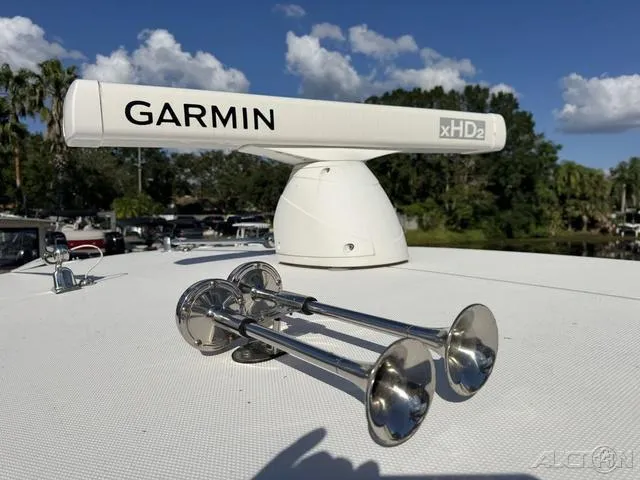 Slide: The Image of 2023 Fountain 34 CC boat with Garmin xHD2 radar and chrome horns. - 35